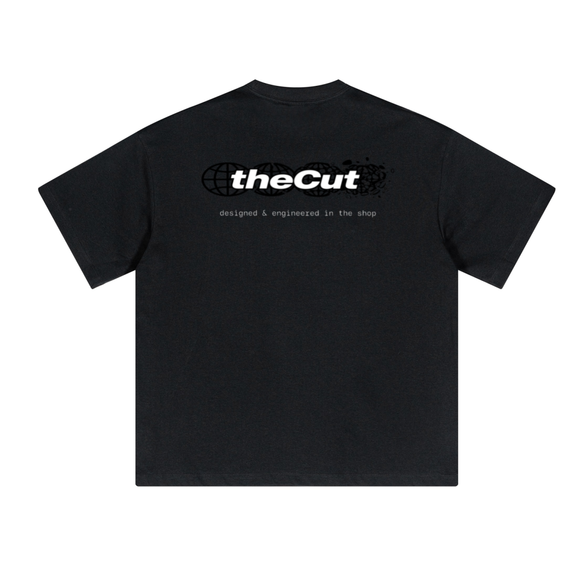 theCut Globe tee in black shown flat from an alternate angle, showing sleeve length and hem.