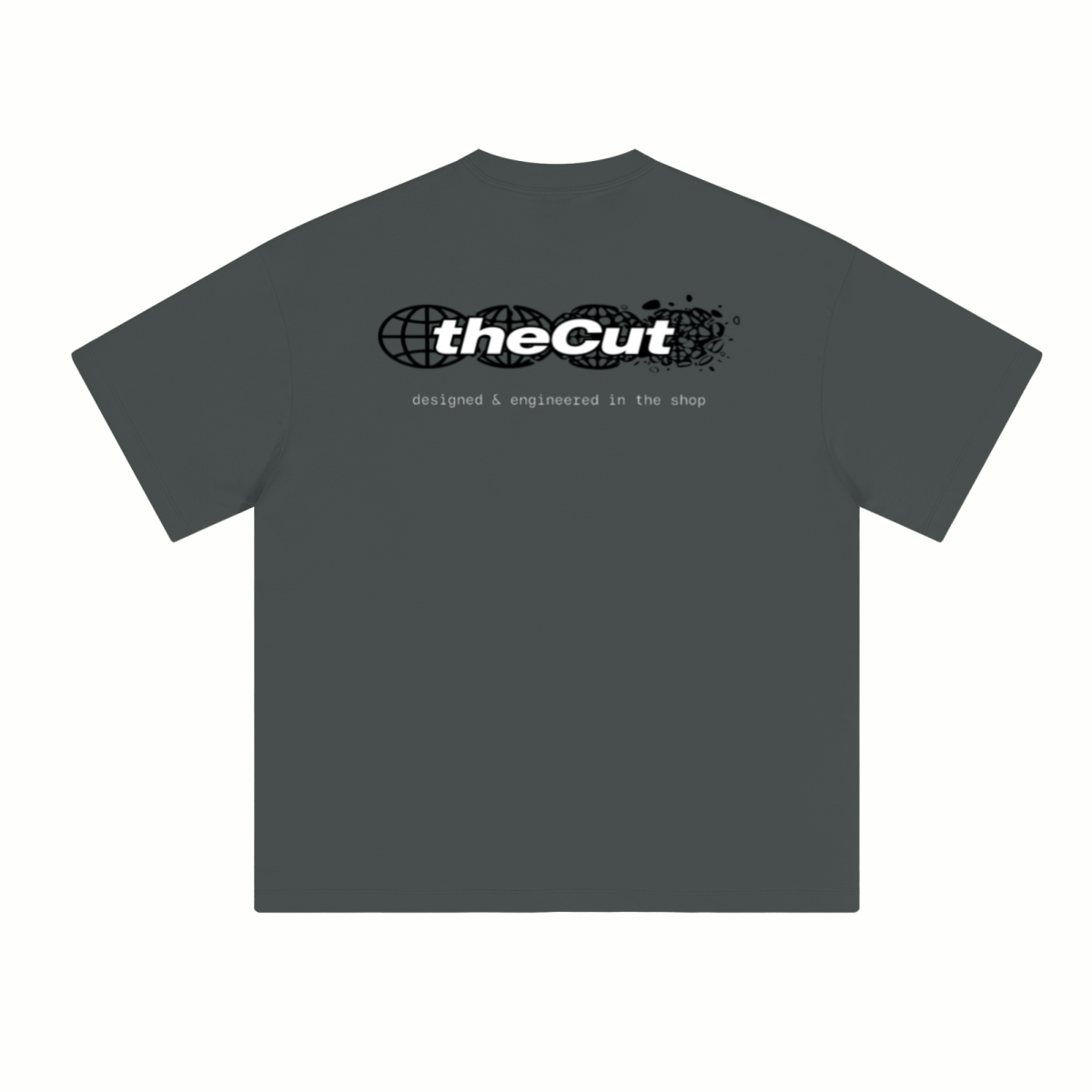 theCut Globe tee in charcoal grey shown flat from an alternate angle, showing sleeve length and hem.