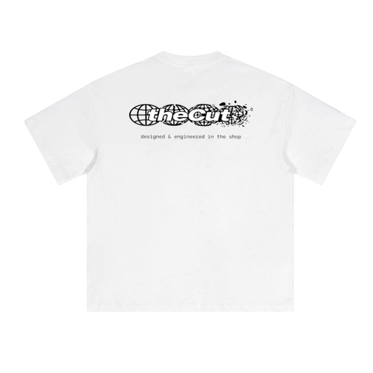 theCut Globe tee in white shown flat from an alternate angle, showing sleeve length and hem.