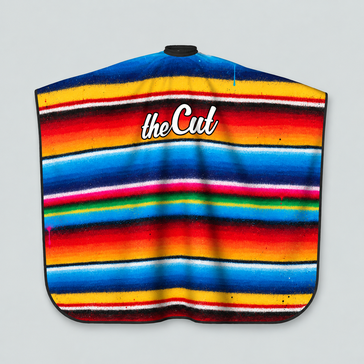 theCut Graffiti Serape Cape — product view on grey background