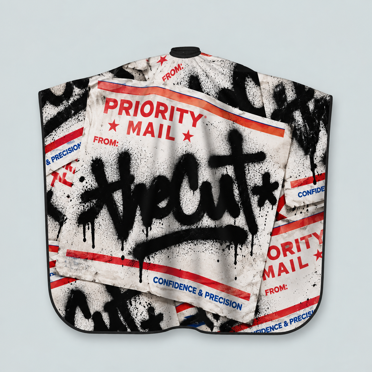 theCut Priority Sticker Bomb Cape — product view on grey background